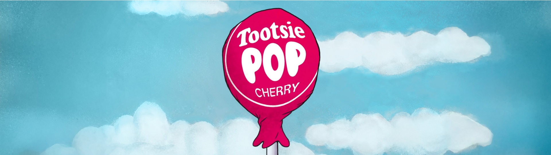 Tootsie Pop Cherry against a blue sky